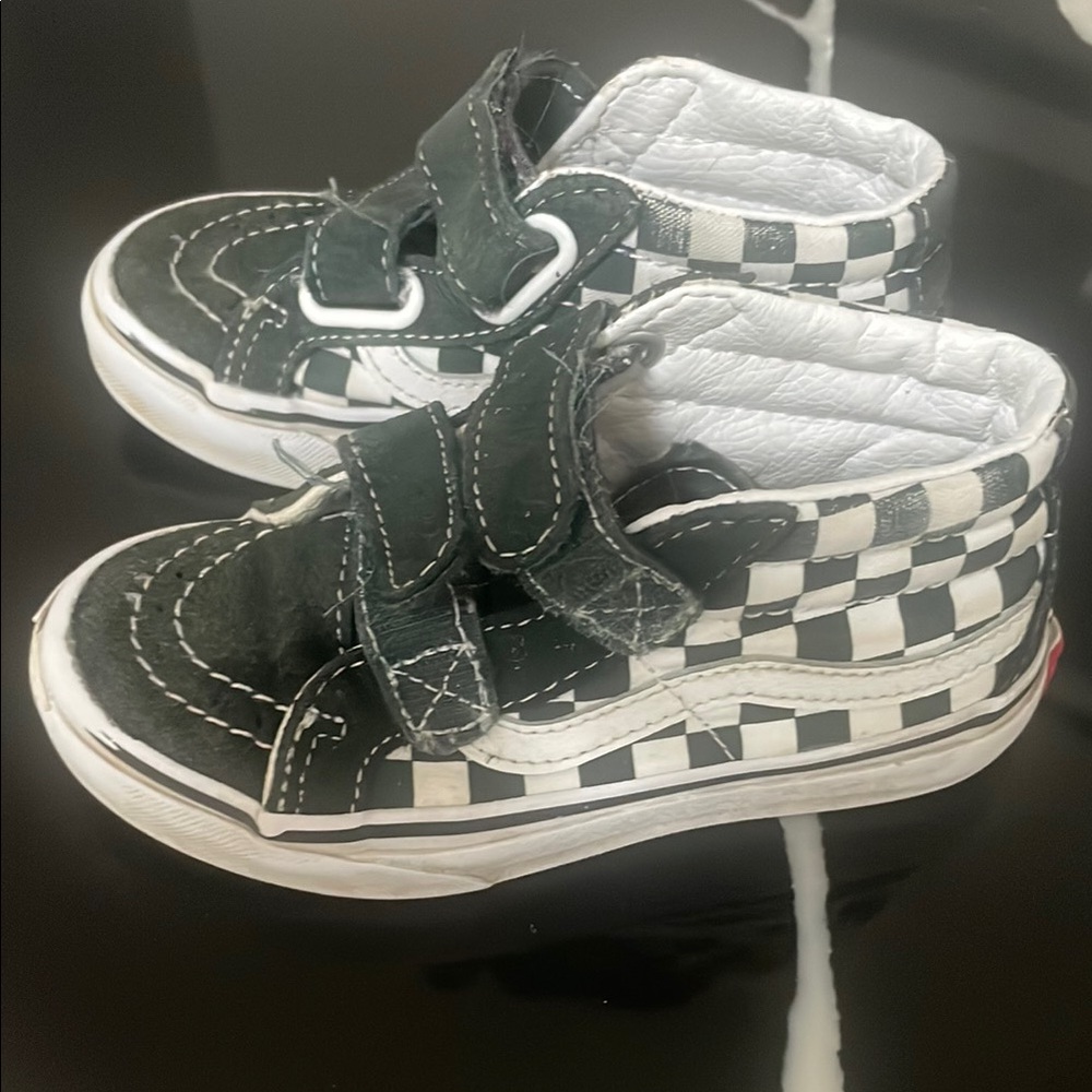 Vans Black and White High-Top Sneakers with Checkerboard Design